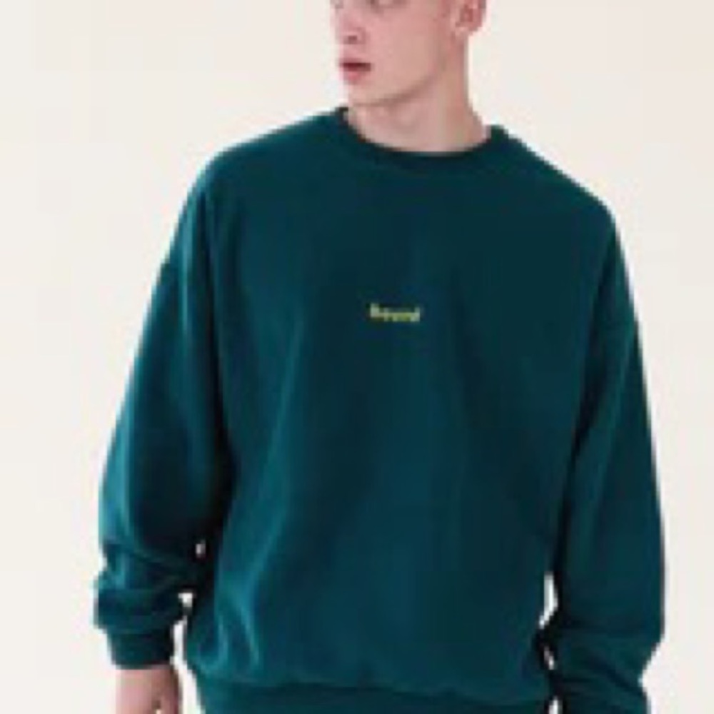 Bound green reverse fleece pullover oversized sweater